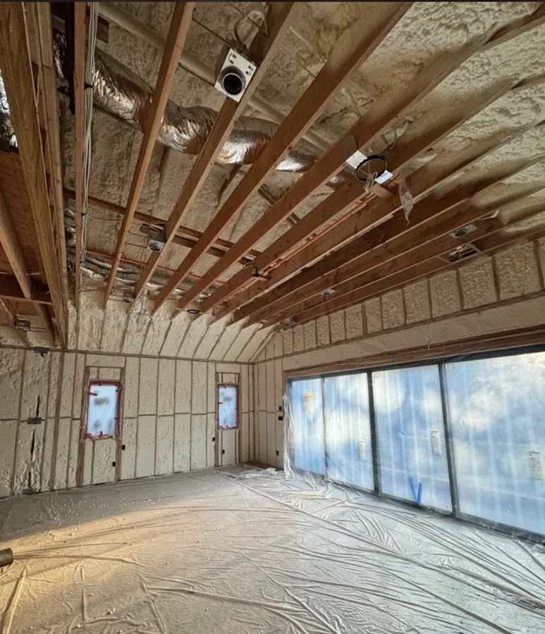 Interior walls and ceiling insulated with spray foam during new construction in Hull